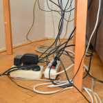 messy cables under desk