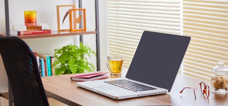 minimalist desk in front of window remote work