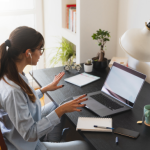 Working from home with laptop at desk